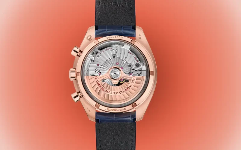 Speedmaster Racing en Or Sedna Calibre